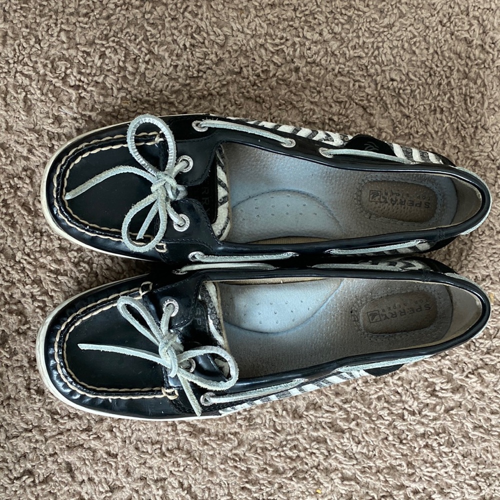 Womens gently used zebra sperry shoes